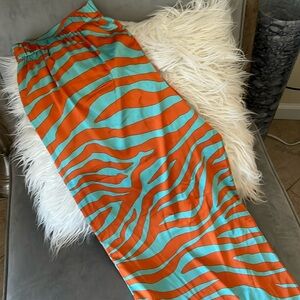 IMAN Global Chic Orange and Aqua Blue Zebra Print Pants